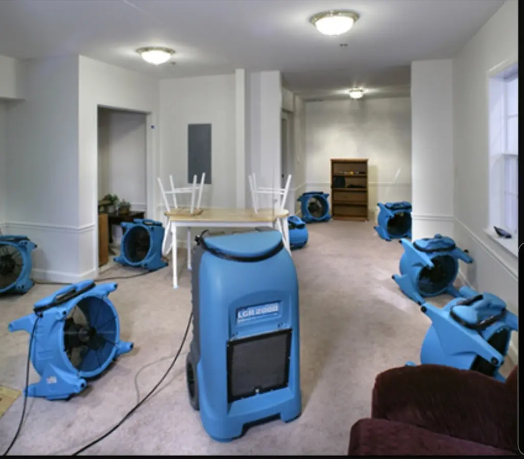 Air movers and dehumidifier setup for Water Damage Restoration in Two Rivers